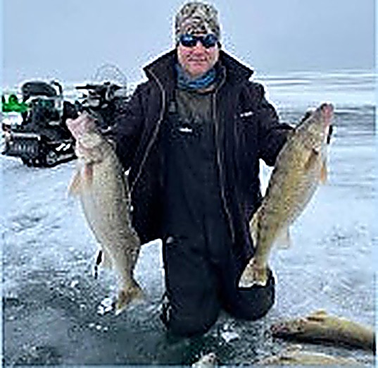 Ice fishing walleye double
